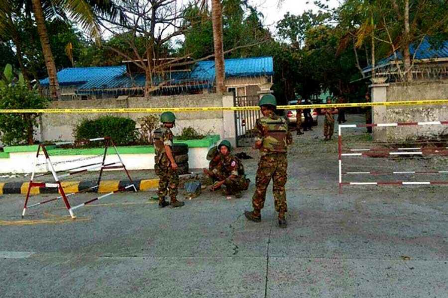 Bomb debris is seen after an explosion outside a building in Sittwe of Myanmar on Saturday. -Reuters Photo