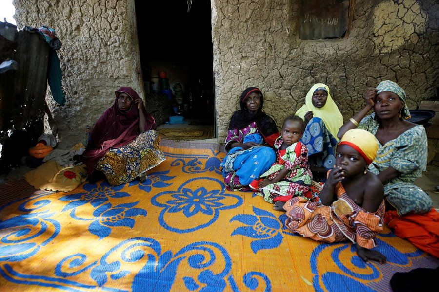 Relatives pay a condolence visit to the mother of one of the abducted Government Girls Science Technical College (GGSTC) Dapchi student in Jumbam village, Yobe State, Nigeria February 24, 2018. (REUTERS)