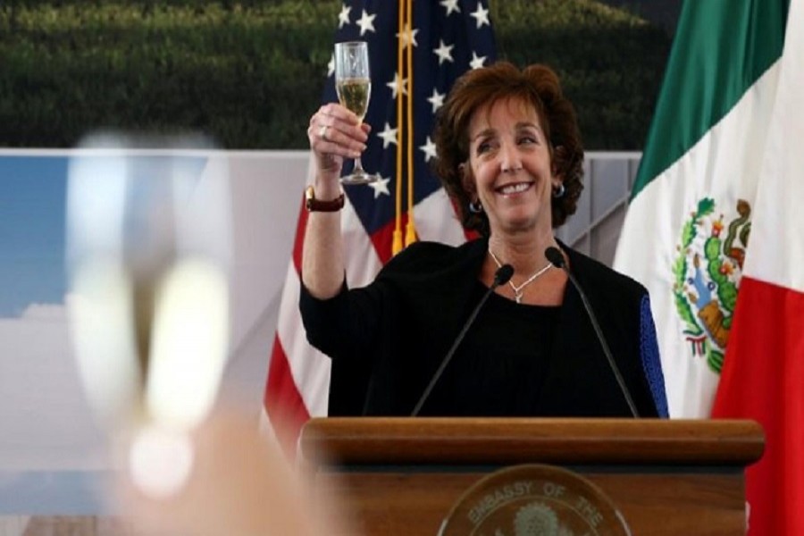 US Ambassador to Mexico Roberta S Jacobson raises her glass in a toast as she attends a ceremony to place the first stone of the new US Embassy in Mexico City, Mexico February 13, 2018. Reuters/Files