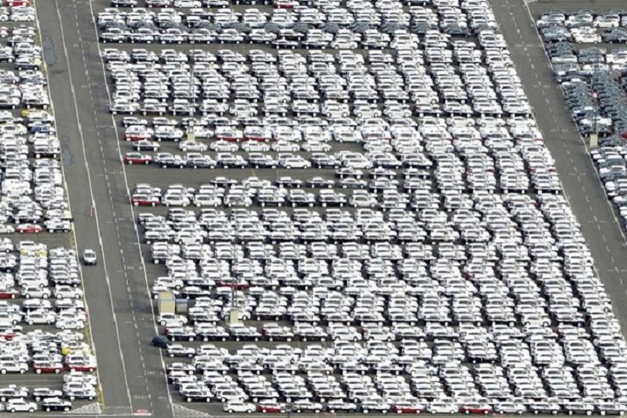 Cars for export stand in a parking area at a shipping terminal in the harbour of the northern German town of Bremerhaven, late October 8, 2012. Reuters/Files