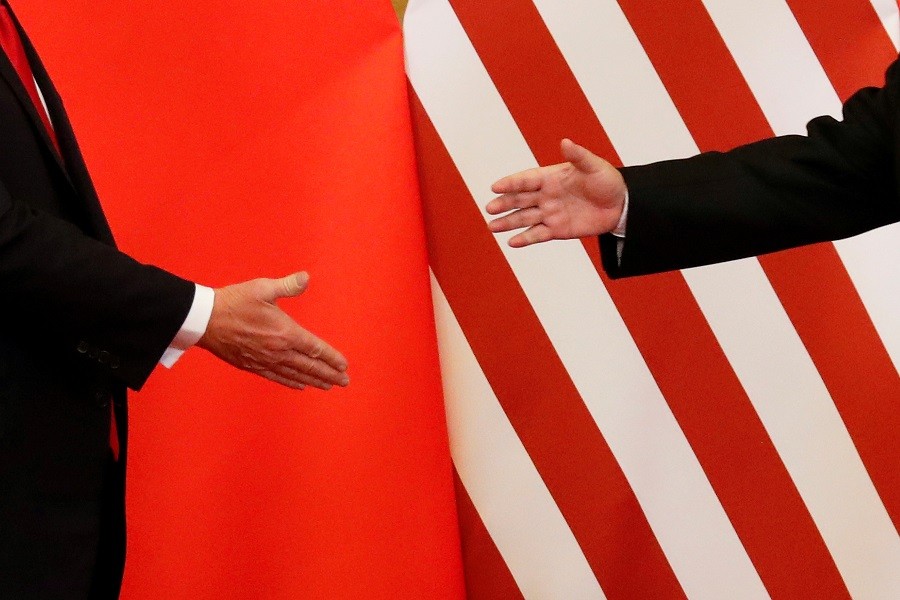 US President Donald Trump and China's President Xi Jinping shake hands after making joint statements at the Great Hall of the People in Beijing, China, November 9, 2017. Reuters/File Photo