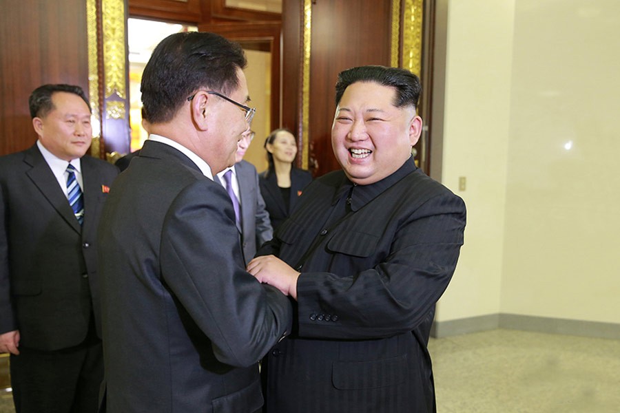 North Korean leader Kim Jong Un meets South Korean delegation on Monday. -Reuters Photo