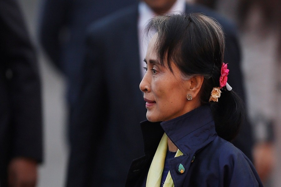 Myanmar's State Counsellor Aung San Suu Kyi walks towards her car after arriving at Air Force Station Palam in New Delhi, India, January 24, 2018. Reuters/Files