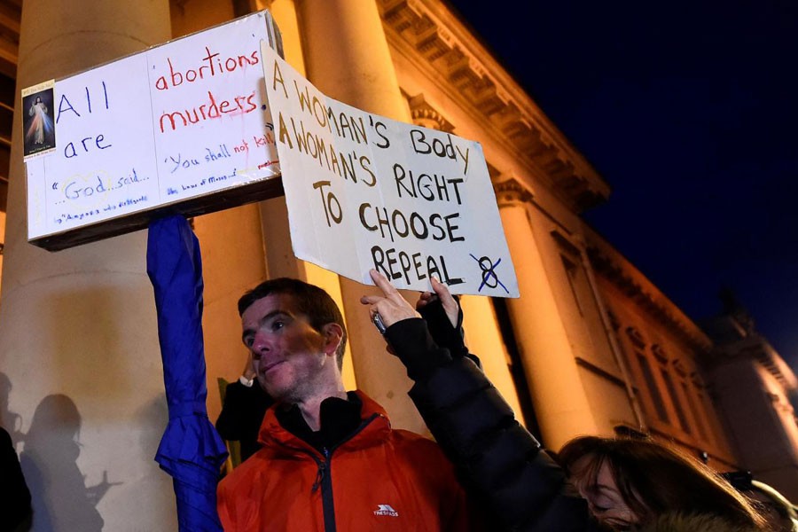 An anti-abortion protestor interrupts speeches during a march for more liberal Irish abortion laws, in Dublin, Ireland, March 8, 2018. Reuters.