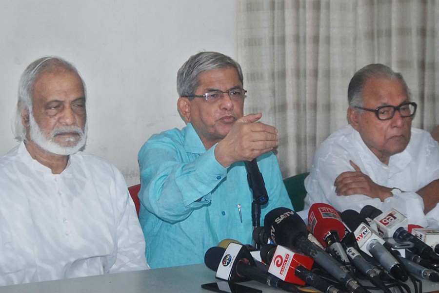 BNP secretary general Mirza Fakhrul (C) speaks at a press conference at party's Nayapaltan central office on Monday. - Focus Bangla photo