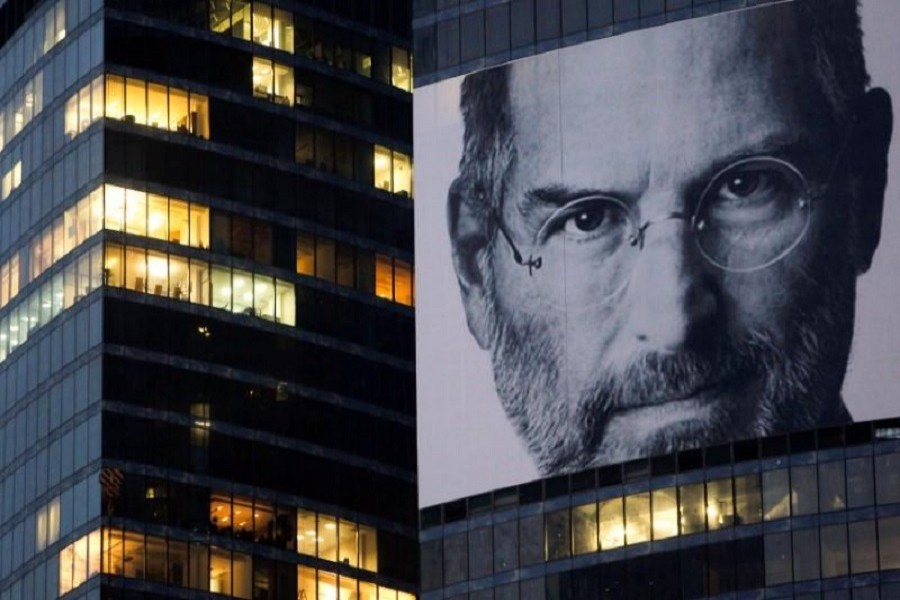 A portrait of Apple co-founder and former CEO Steve Jobs is placed on the Federation Tower skyscraper in Moscow's new business district, October 19 2011. Reuters/Files