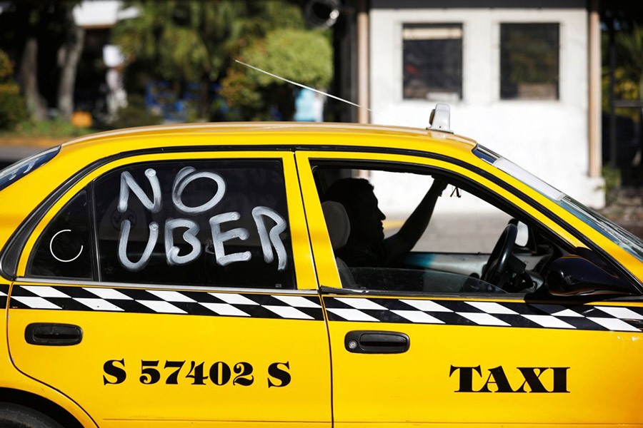 A San Salvador taxi driver takes part in a demonstration against Uber - Reuters file photo used for representational purpose only