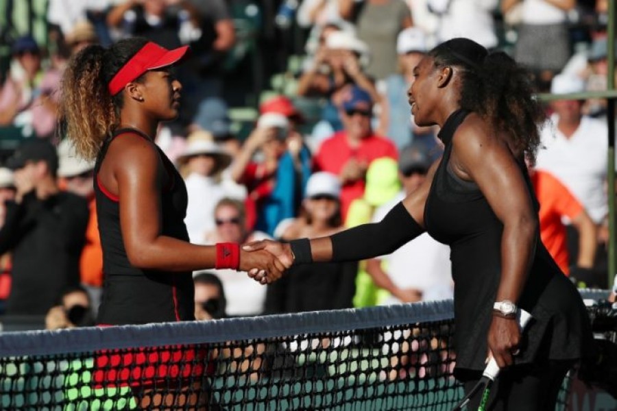 Naomi Osaka of Japan (L) shakes hands with Serena Williams of the United States (R) after their match on day two of the Miami Open at Tennis Center at Crandon Park. (USA TODAY Sports/Reuters)