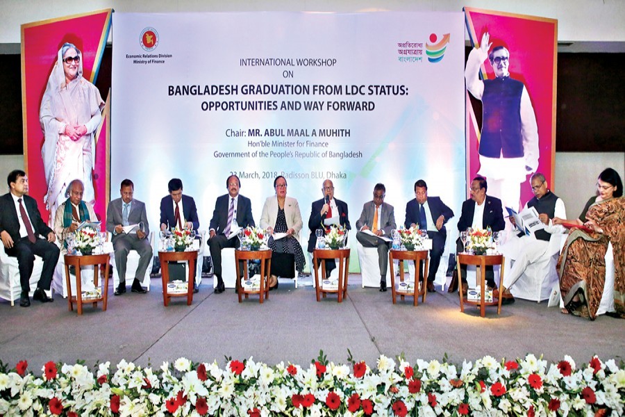 Finance Minister A M A Muhith speaking at an international workshop on 'Bangladesh Graduation from LDC Status: Opportunities and Way Forward' at a city hotel on Friday — FE Photo
