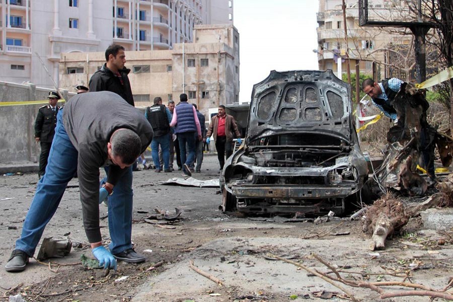 An Egyptian forensics team checks the location of a bombing in Alexandria, Egypt on Saturday - Reuters photo