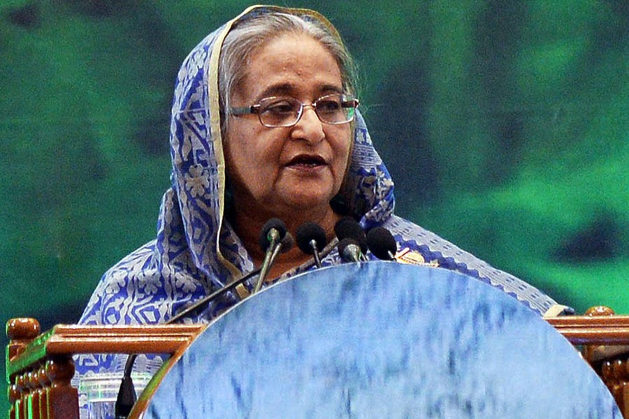 Prime Minister Sheikh Hasina addressing a function on Tuesday marking the World Water Day 2018 - Focus Bangla photo