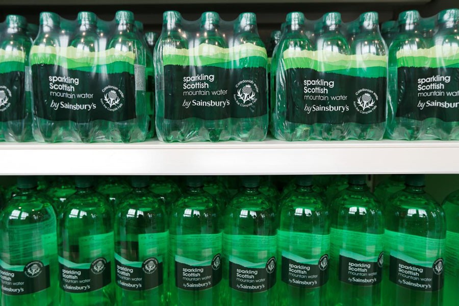 Bottles of own brand sparkling water are displayed in a Sainsbury's store in Redhill, Britain, March 27. Reuters/File Photo
