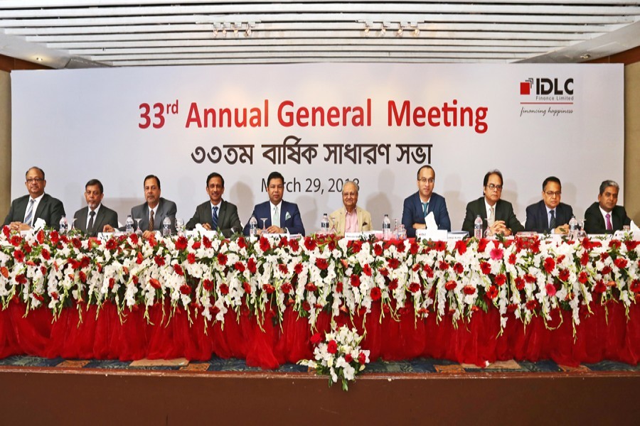 Aziz Al Mahmood, Chairman of IDLC Finance Limited, presiding over the 33rd annual general meeting (AGM) of the company at Radisson Blu Water Garden Hotel in the city on Thursday in presence of Arif Khan, CEO & Managing Director of the company where the AGM approved 30 per cent cash dividend for the company's shareholders for the year 2017