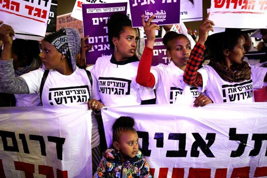 People take part in a protest against the Israeli government's plan to deport African migrants, in Tel Aviv, Israel on March 24, 2018. Reuters.