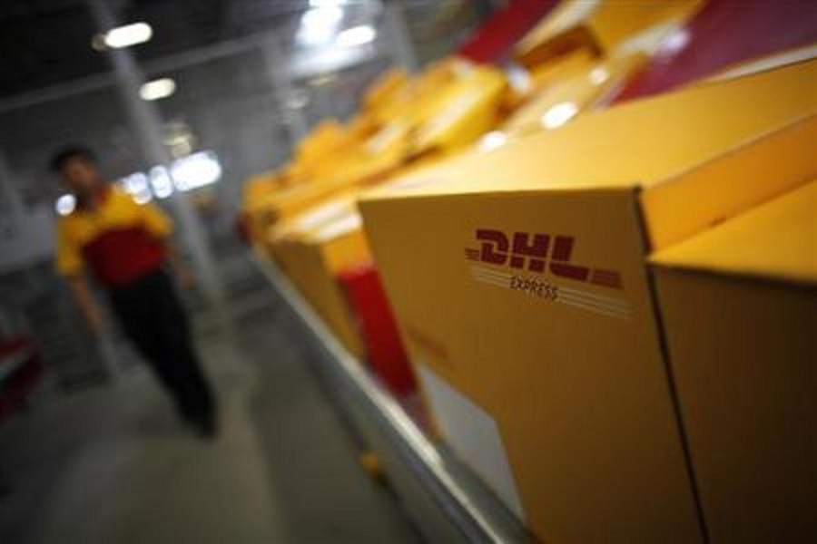 An employee is seen next to his workstation during a operational test of the new DHL North Asia Hub in Shanghai July 12, 2012. Reuters/Files