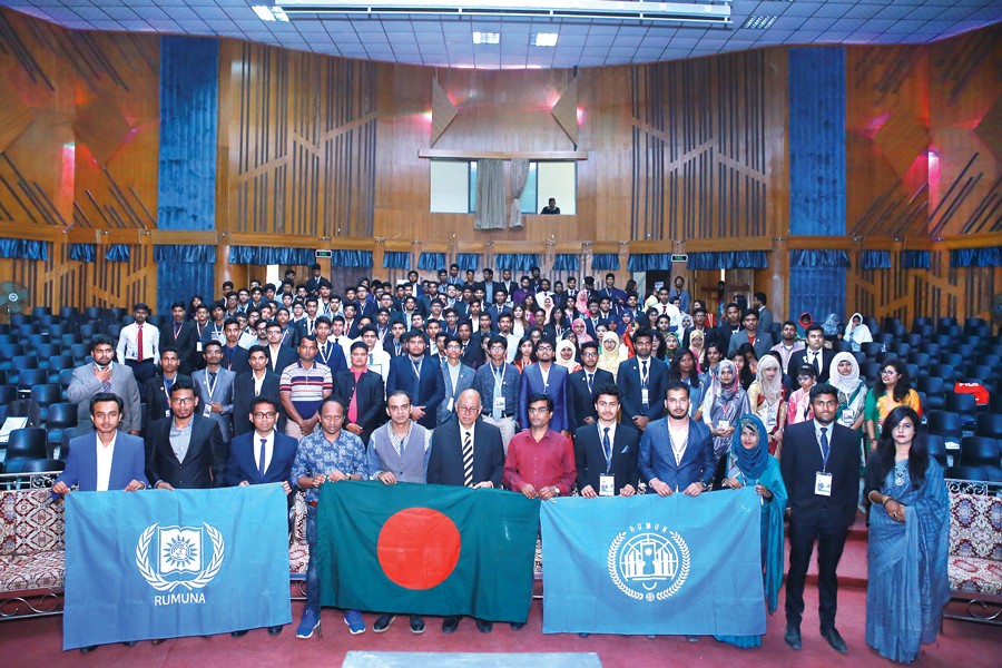 Participants and guests pose for a photo session in inaugural session of Rajshahi University Model United Nations Association (RUMUNA) held recently