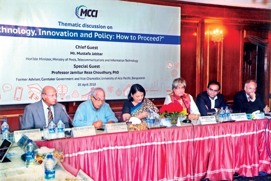 Post, Telecommunication and Information Technology Minister Mustafa Jabbar speaking at a discussion, organised by Metropolitan Chamber of Commerce and Industry, Dhaka (MCCI) at its conference room in the capital on Thursday — MCCI