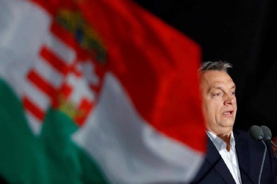 Hungarian Prime Minister Viktor Orban addresses the supporters after the announcement of the partial results of parliamentary election in Budapest, Hungary, April 8, 2018. Reuters