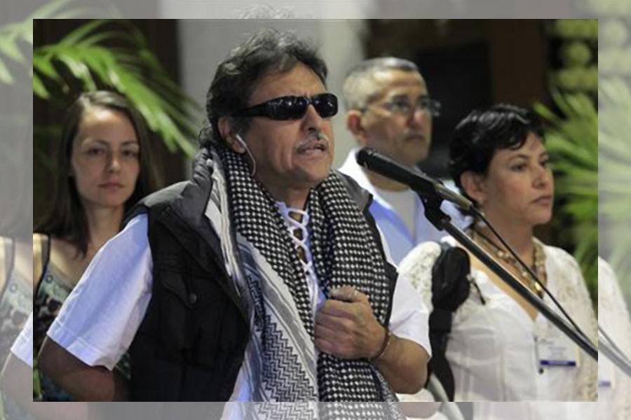 Revolutionary Armed Forces of Colombia (FARC) negotiator Jesus Santrich speaks to the media before the start of talks in Havana March 11, 2013. Reuters.