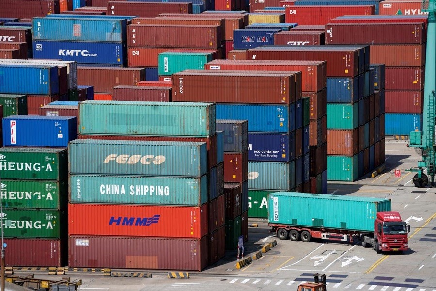 Shipping containers are seen at the port in Shanghai, China April 10, 2018. Reuters