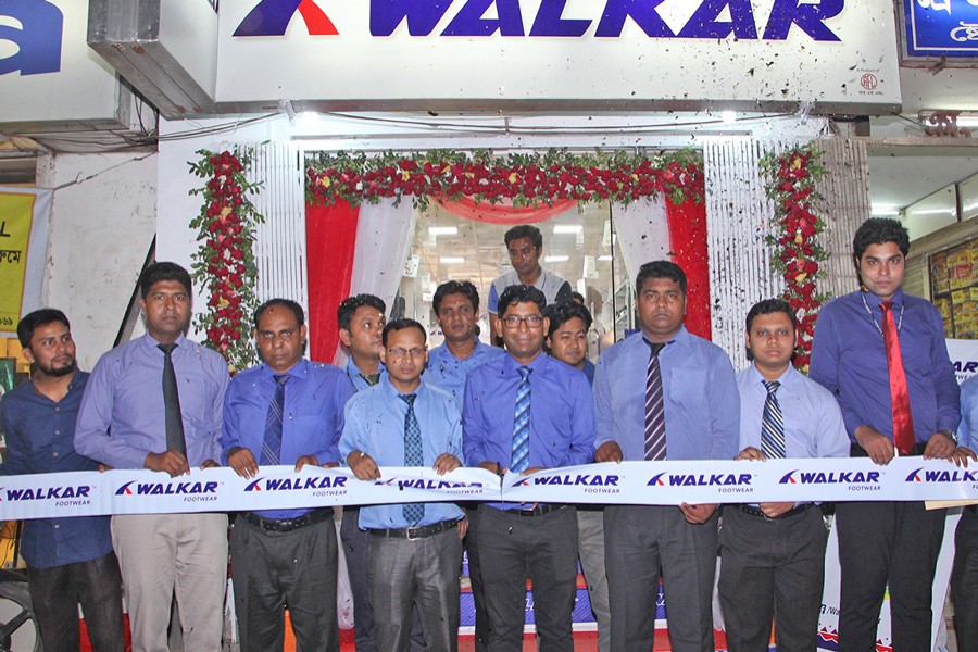 RFL Group's Managing Director RN Paul inaugurating an outlet of its footwear brand 'Walker' in Rangpur city recently with Brand Manager of Walkar Footwear Mainul Hassan and Chief Operating Officer Kamrul Hasan present