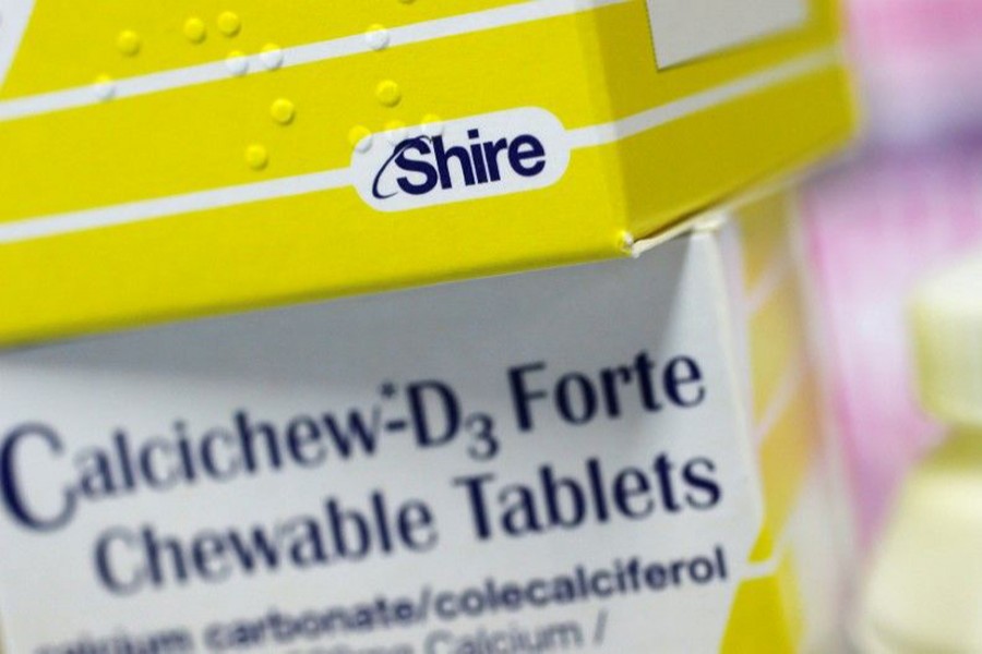 Vitamins made by Shire are displayed at a chemist’s in northwest London, July 11, 2014. Reuters/File