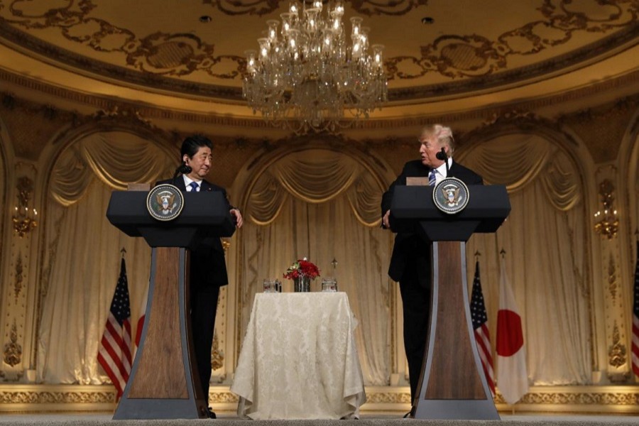 US President Donald Trump (R) speaks as he hosts a joint press conference with Japan's Prime Minister Shinzo Abe at Trump's Mar-a-Lago estate in Palm Beach, Florida, US, April 18, 2018. Reuters