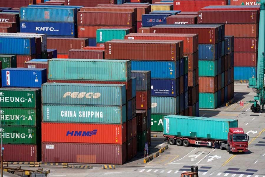 Shipping containers are seen at the port in Shanghai, China recently Photo: Reuters