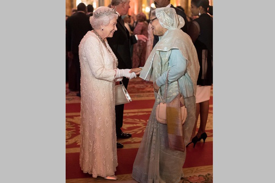 Britain's Queen Elizabeth greets Sheikh Hasina, Prime Minister of Bangladesh, in the Blue Drawing Room at Buckingham Palace as she hosts a dinner during the Commonwealth Heads of Government Meeting in London, Britain April 19. Reuters/File