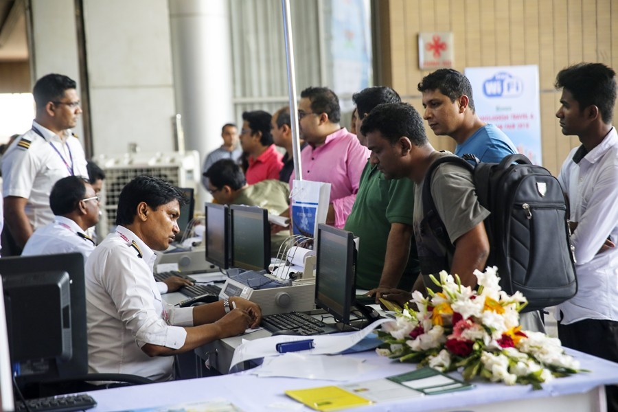 Visitors crowding around a stall at Biman Bangladesh Travel & Tourism Fair at Bangabandhu International Conference Centre in the city on Friday — FE Photo