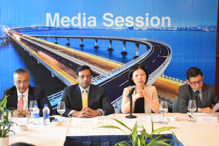 Jean Lu, head of global banking and corporate and institutional banking of Standard Chartered China addressing the media session organised by SCB styled 'Belt and Road – China-Bangladesh Opportunities' at the capital's Westin hotel recently. Naser Ezaz Bijoy, chief executive officer of SCB also seen-FE photo