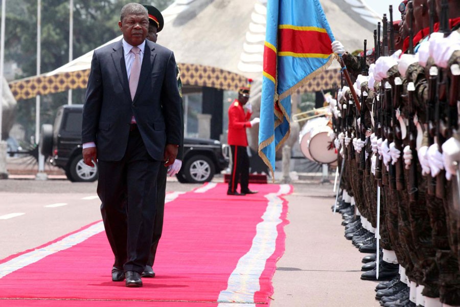 Angolan President Joao Lourenco inspects a guard of honour on a visit to the Democratic Republic of Congo, Feb. 14, 2018. Reuters file photo.