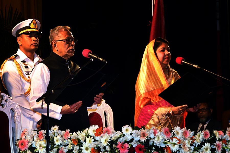 Jatiya Sangsad Speaker Shirin Sharmin Chaudhury administering the oath of office to President Md Abdul Hamid for the second term at Bangabhaban on Tuesday. -Focus Bangla Photo