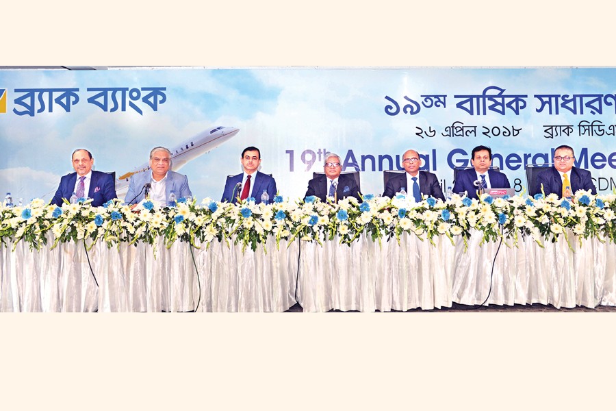 Sir Fazle Hasan Abed, KCMG, Chairman of BRAC Bank Limited, Directors Shib Narayan Kairy, Kazi Mahmood Sattar, Kaiser Kabir, and Asif Saleh and Managing Director & CEO Selim R. F. Hussain pose for photo session at the 19th Annual General Meeting (AGM) of the Bank held at BRAC-CDM, Savar Thursday