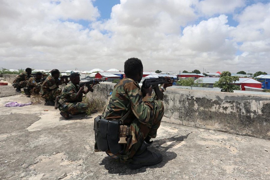 Members of Somali Armed Forces take their position during fighting between the military and police backed by intelligence forces in the Dayniile district of Mogadishu, Somalia. Reuters photo used for representation.