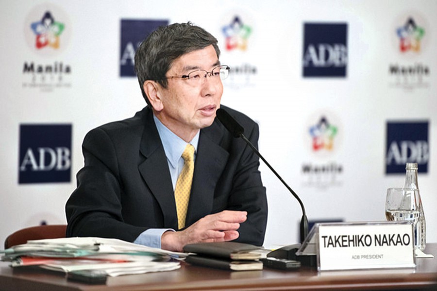 ADB President Takehiko Nakao addressing a press briefing at its headquarters in Manila, Philippines on Thursday