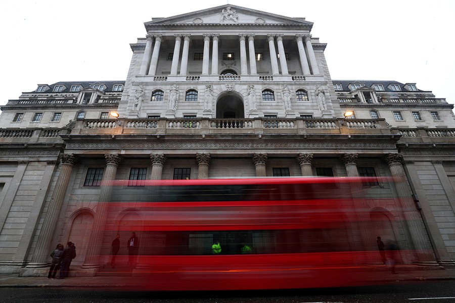 A bus passes the Bank of England in London, Britain on April 9 last - Reuters photo