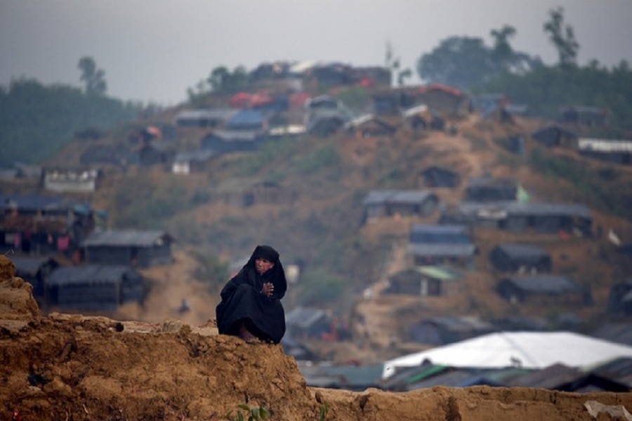 A Rohingya refugee sits on a hill overlooking a camp in Cox's Bazar, Bangladesh, Sept 27, 2017. Reuters/File Photo