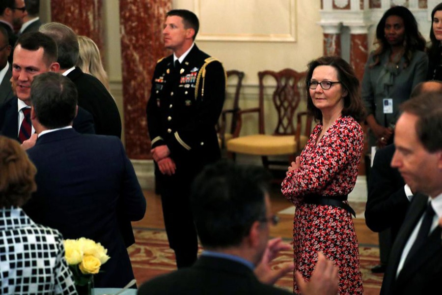 US Central Intelligence Agency (CIA) director nominee Gina Haspel (C) attends Secretary of State Mike Pompeo's ceremonial swearing-in at the State Department in Washington, May 2, 2018. Reuters