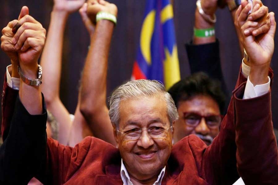Mahathir Mohamad, former Malaysian prime minister and opposition candidate for Pakatan Harapan (Alliance of Hope) reacts during a news conference after general election, in Petaling Jaya, Malaysia, May 9, 2018. Reuters