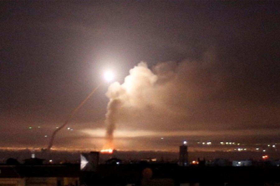 Israel fires dozens of rockets into Syria