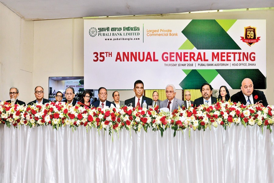 Chairman of Pubali Bank Limited Habibur Rahman presiding over the 35th annual general meeting of the bank held at the bank's auditorium on Thursday