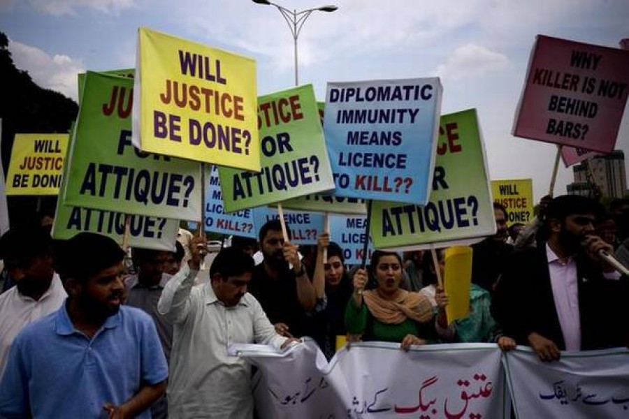 Pakistani protesters stage a rally demanding a trial for an American diplomat involved in a vehicle crash that killed a person, in Islamabad, Pakistan, on April 10, 2018. Pakistan has decided to impose reciprocal restrictions on US diplomats after US imposed similar curbs on Pakistani diplomats.  - Photo Credit: AP