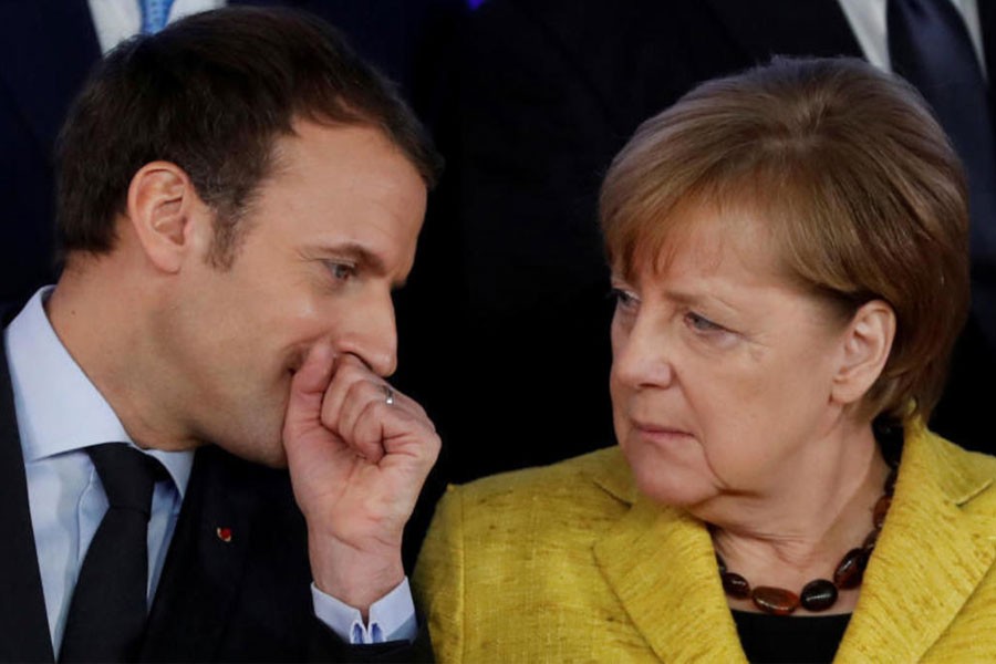File photo of French President Emmanuel Macron and German Chancellor Angela Merkel. Reuters.