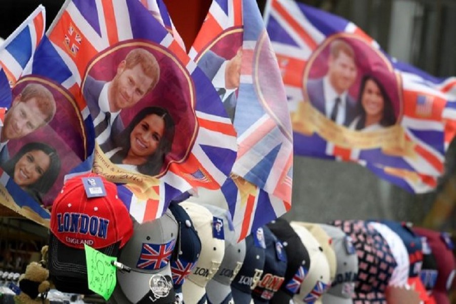 Flags are seen for sale ahead of the forthcoming wedding of Britain's Prince Harry and his fiancee Meghan Markle, on Oxford Street in London, Britain, May 11, 2018. Reuters