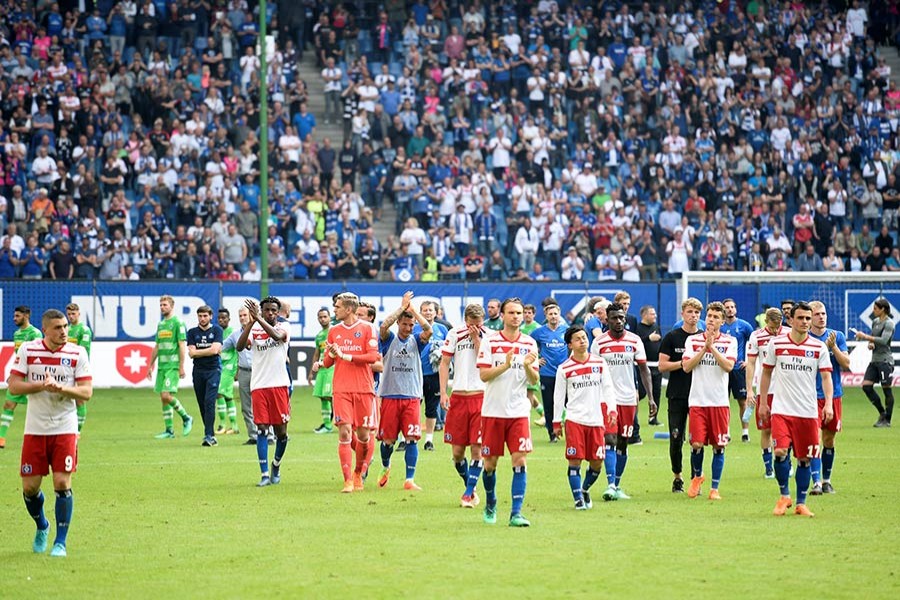 Players of Hamburg SV – relegated for the first time in its history – look dejected as they applaud the fans at the end of the match - Reuters photo