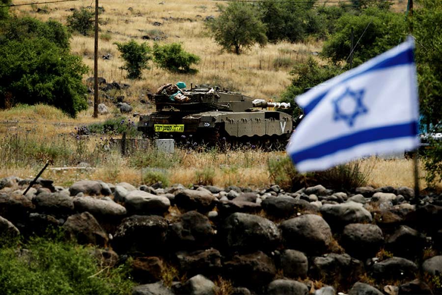 An Israeli tank in the Israeli-occupied Golan Heights.        —Photo: Reuters