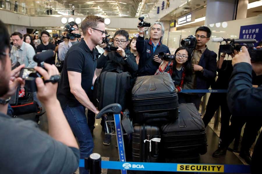 CNN's Will Ripley arrives at Beijing aiport to board a plane to North Korea in Beijing, China, May 22, 2018. Reuters