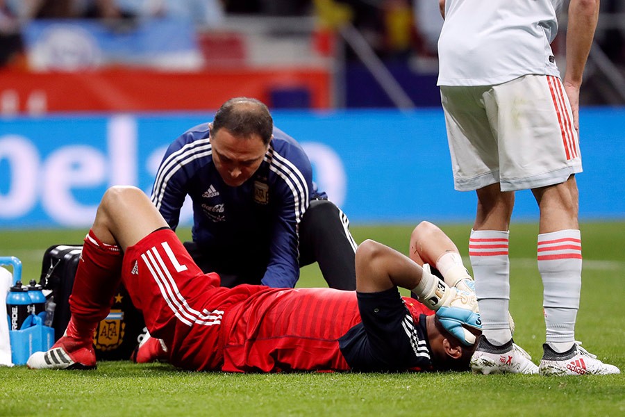 Argentina's Sergio Romero receives medical treatment after sustaining an injury - Reuters file photo used for representation