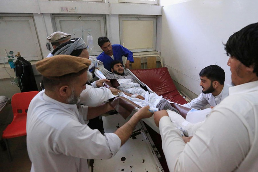 An injured man recevies treatment at a hospital in Jalalabad city, Afghanistan on Tuesday - Reuters